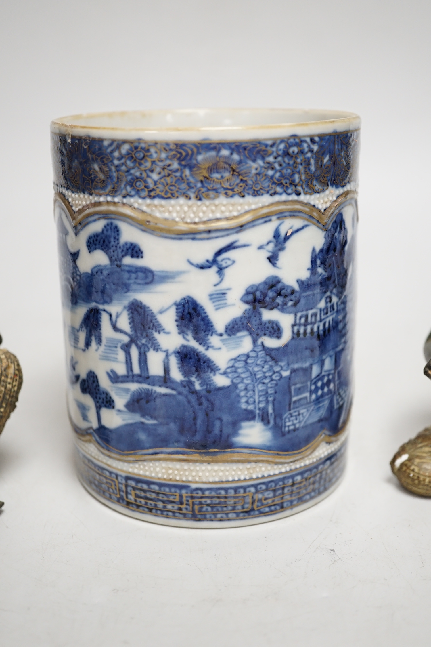 An 18th century Chinese export blue and white mug and two Thai bronze figures, mug 13cm tall